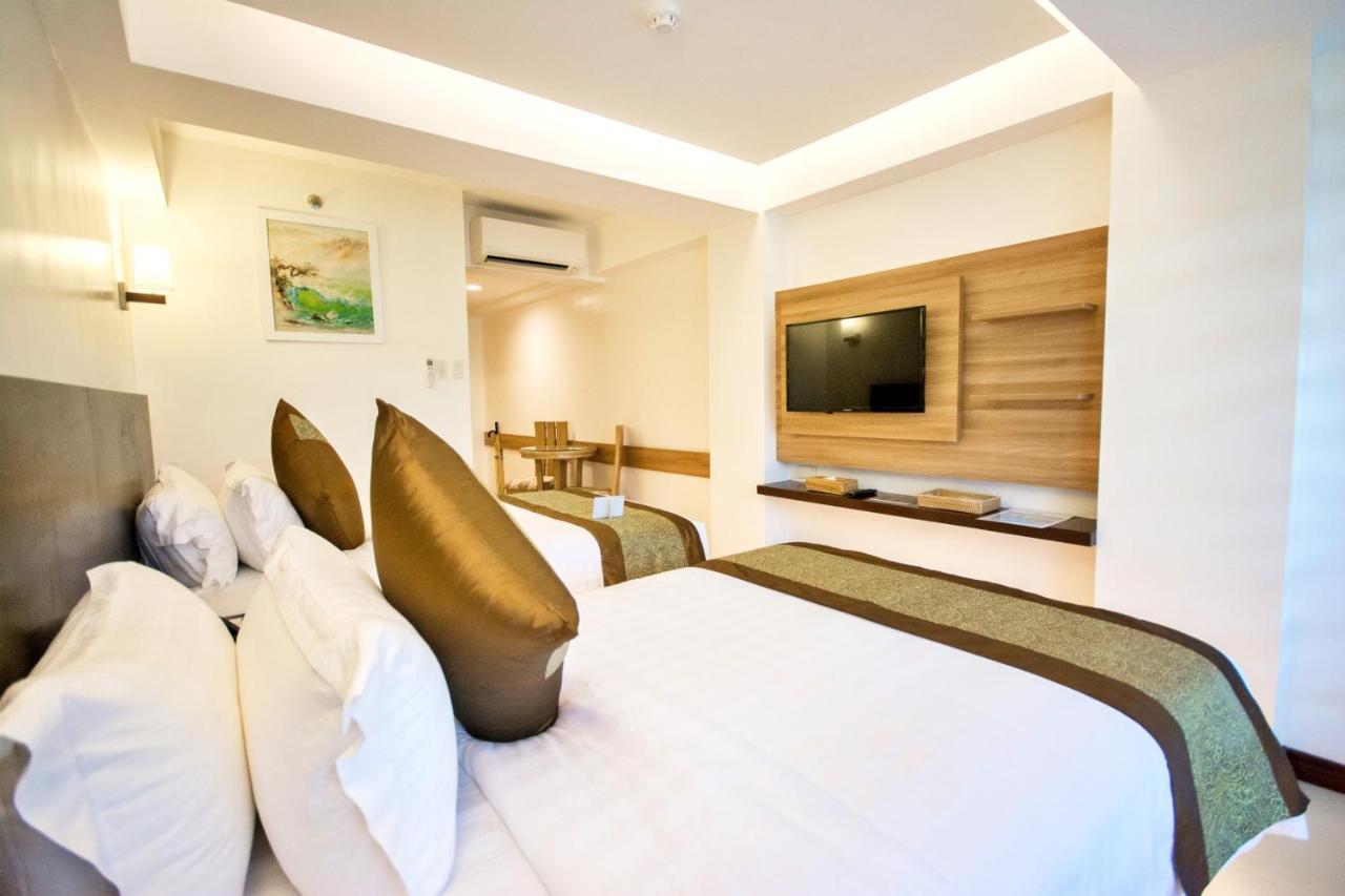 คอมแมนเดอร์ สวีท เดอ โบราไกย์ Hotel Manoc-Manoc ภายนอก รูปภาพ
