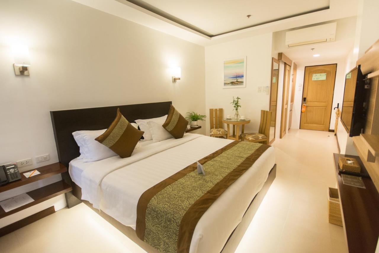 คอมแมนเดอร์ สวีท เดอ โบราไกย์ Hotel Manoc-Manoc ภายนอก รูปภาพ