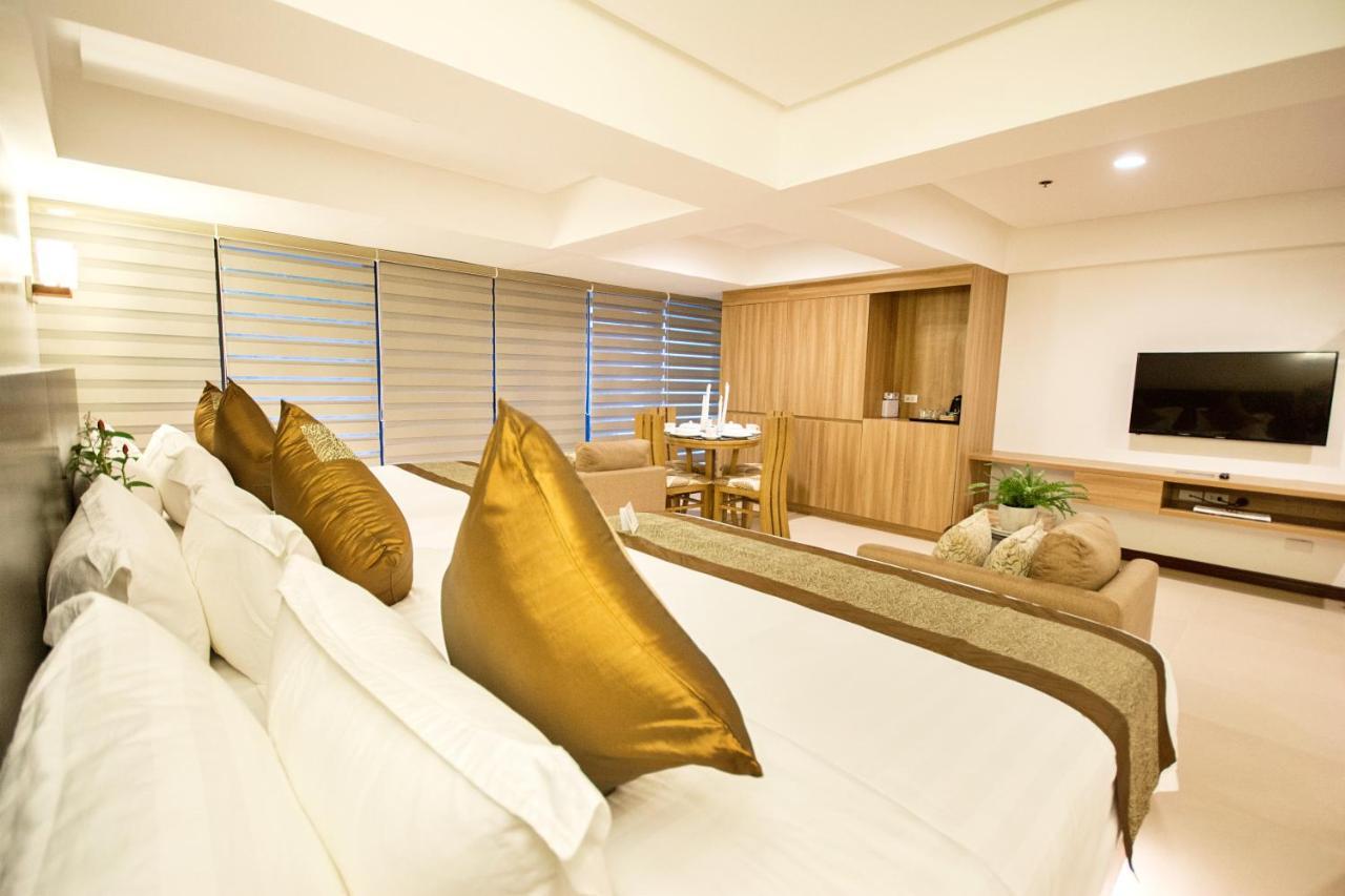 คอมแมนเดอร์ สวีท เดอ โบราไกย์ Hotel Manoc-Manoc ภายนอก รูปภาพ