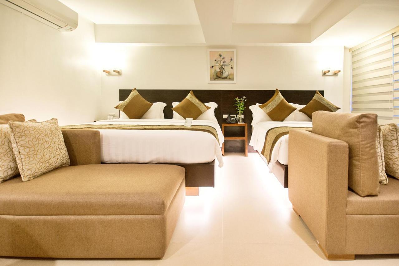 คอมแมนเดอร์ สวีท เดอ โบราไกย์ Hotel Manoc-Manoc ภายนอก รูปภาพ