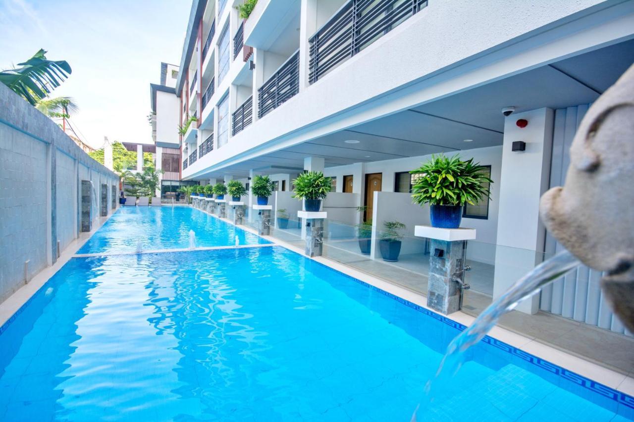 คอมแมนเดอร์ สวีท เดอ โบราไกย์ Hotel Manoc-Manoc ภายนอก รูปภาพ