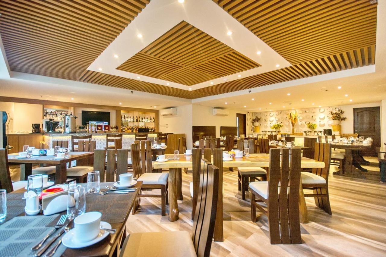 คอมแมนเดอร์ สวีท เดอ โบราไกย์ Hotel Manoc-Manoc ภายนอก รูปภาพ