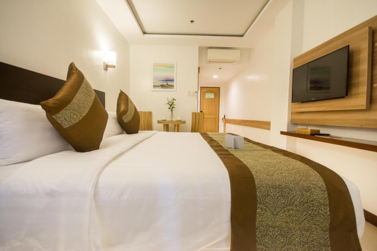 คอมแมนเดอร์ สวีท เดอ โบราไกย์ Hotel Manoc-Manoc ภายนอก รูปภาพ