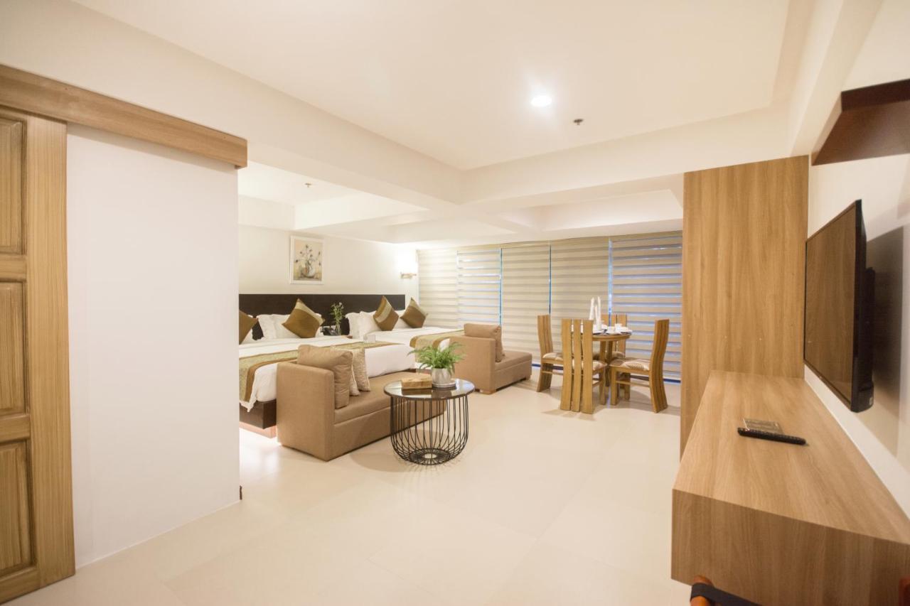 คอมแมนเดอร์ สวีท เดอ โบราไกย์ Hotel Manoc-Manoc ภายนอก รูปภาพ