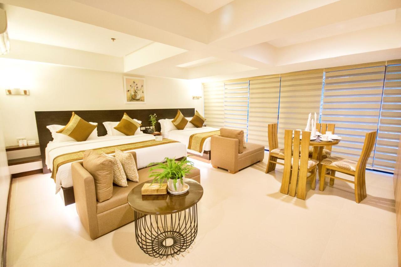 คอมแมนเดอร์ สวีท เดอ โบราไกย์ Hotel Manoc-Manoc ภายนอก รูปภาพ