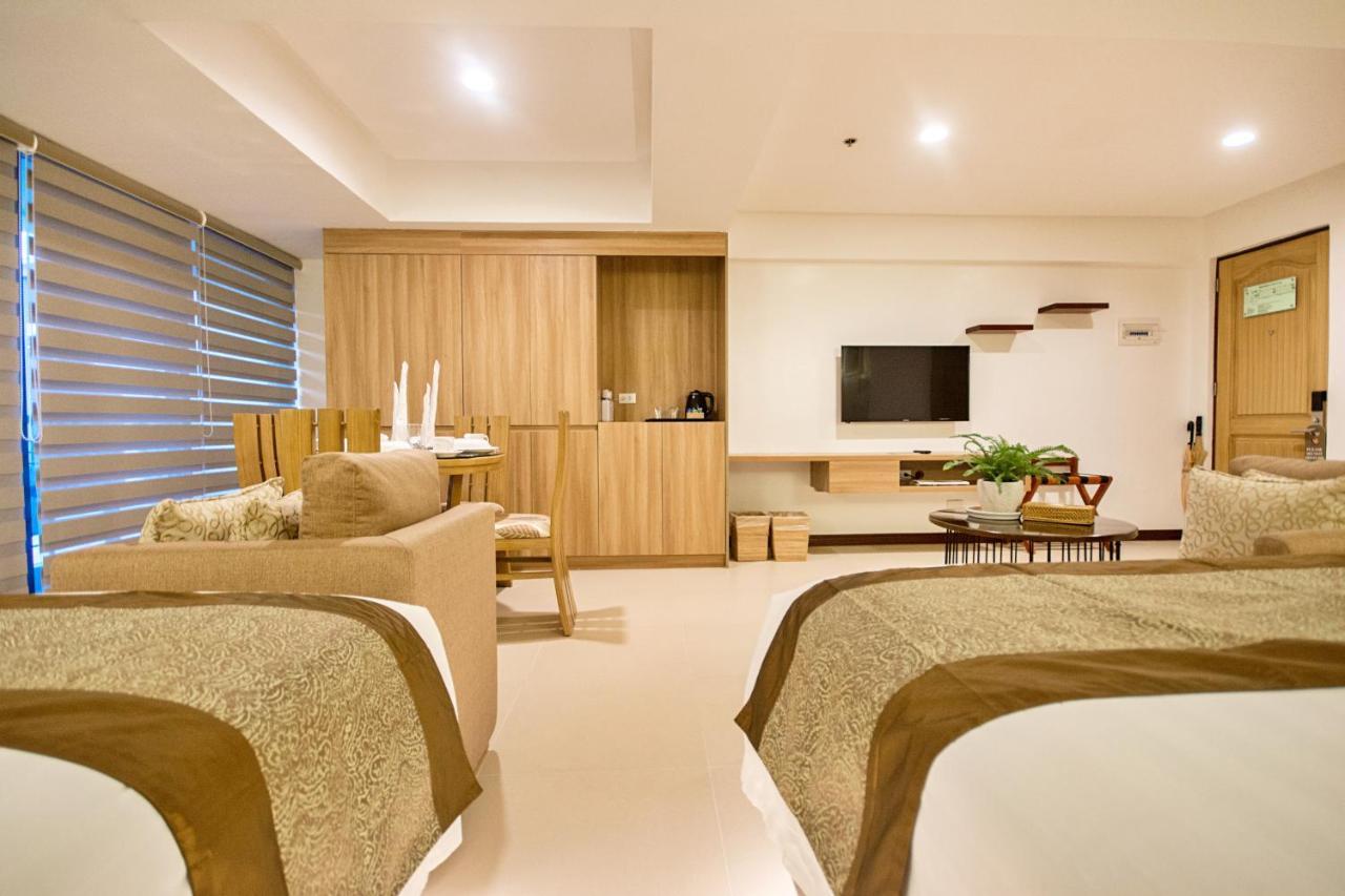 คอมแมนเดอร์ สวีท เดอ โบราไกย์ Hotel Manoc-Manoc ภายนอก รูปภาพ