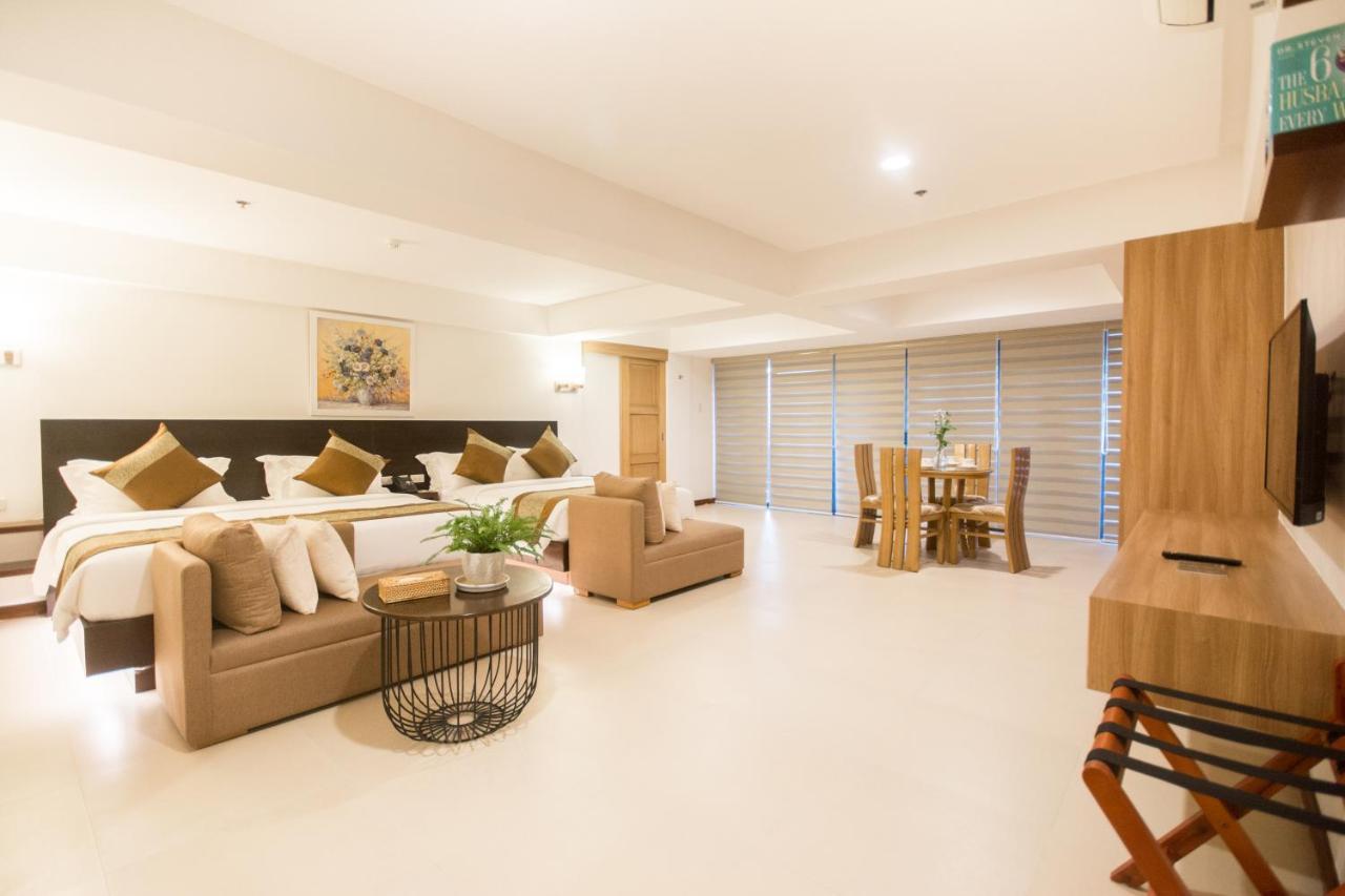 คอมแมนเดอร์ สวีท เดอ โบราไกย์ Hotel Manoc-Manoc ภายนอก รูปภาพ