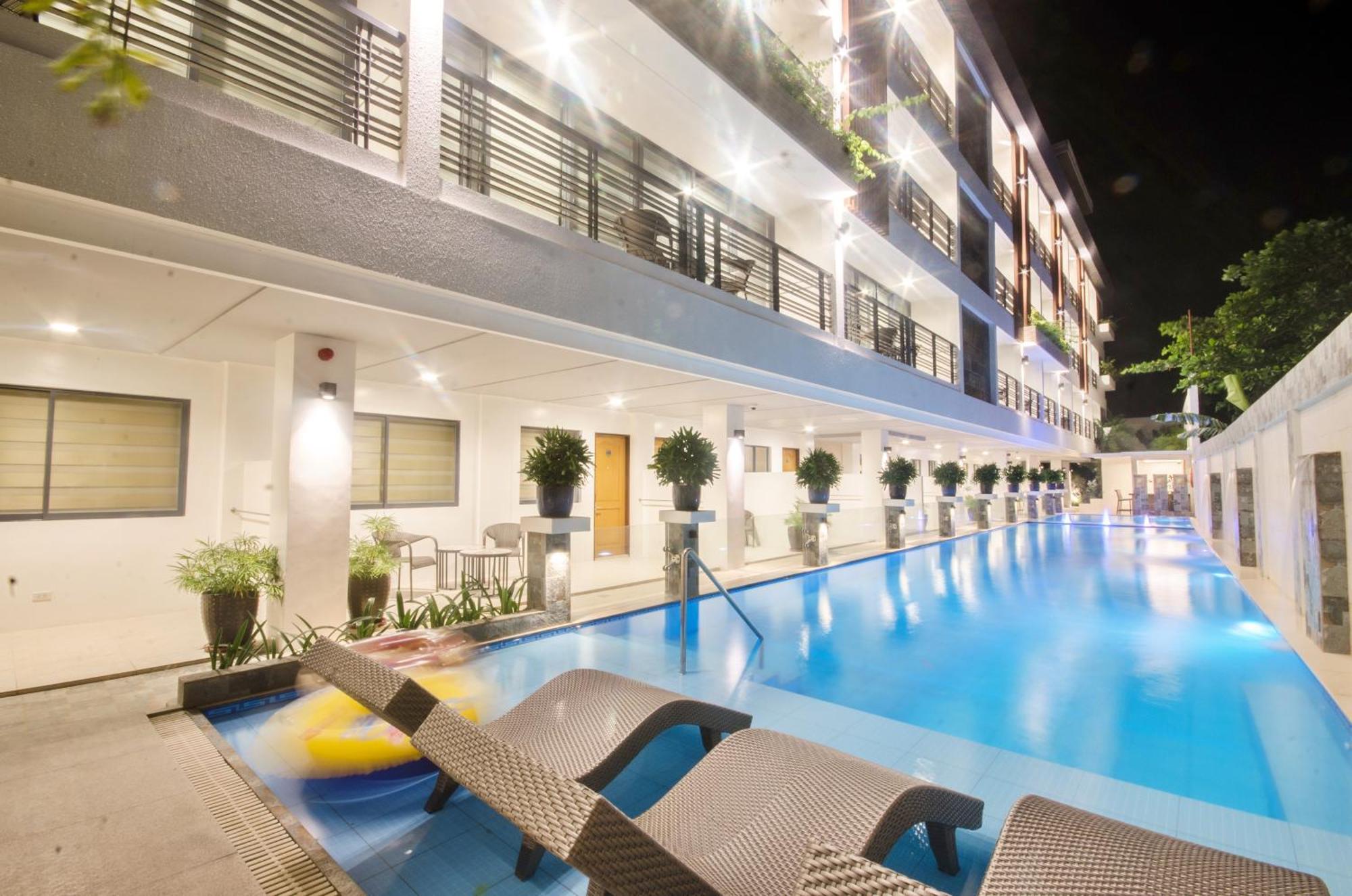 คอมแมนเดอร์ สวีท เดอ โบราไกย์ Hotel Manoc-Manoc ภายนอก รูปภาพ