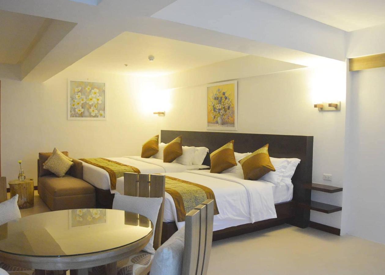 คอมแมนเดอร์ สวีท เดอ โบราไกย์ Hotel Manoc-Manoc ภายนอก รูปภาพ