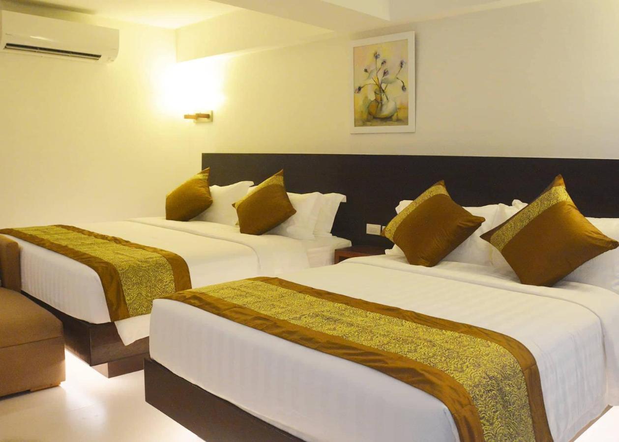 คอมแมนเดอร์ สวีท เดอ โบราไกย์ Hotel Manoc-Manoc ภายนอก รูปภาพ