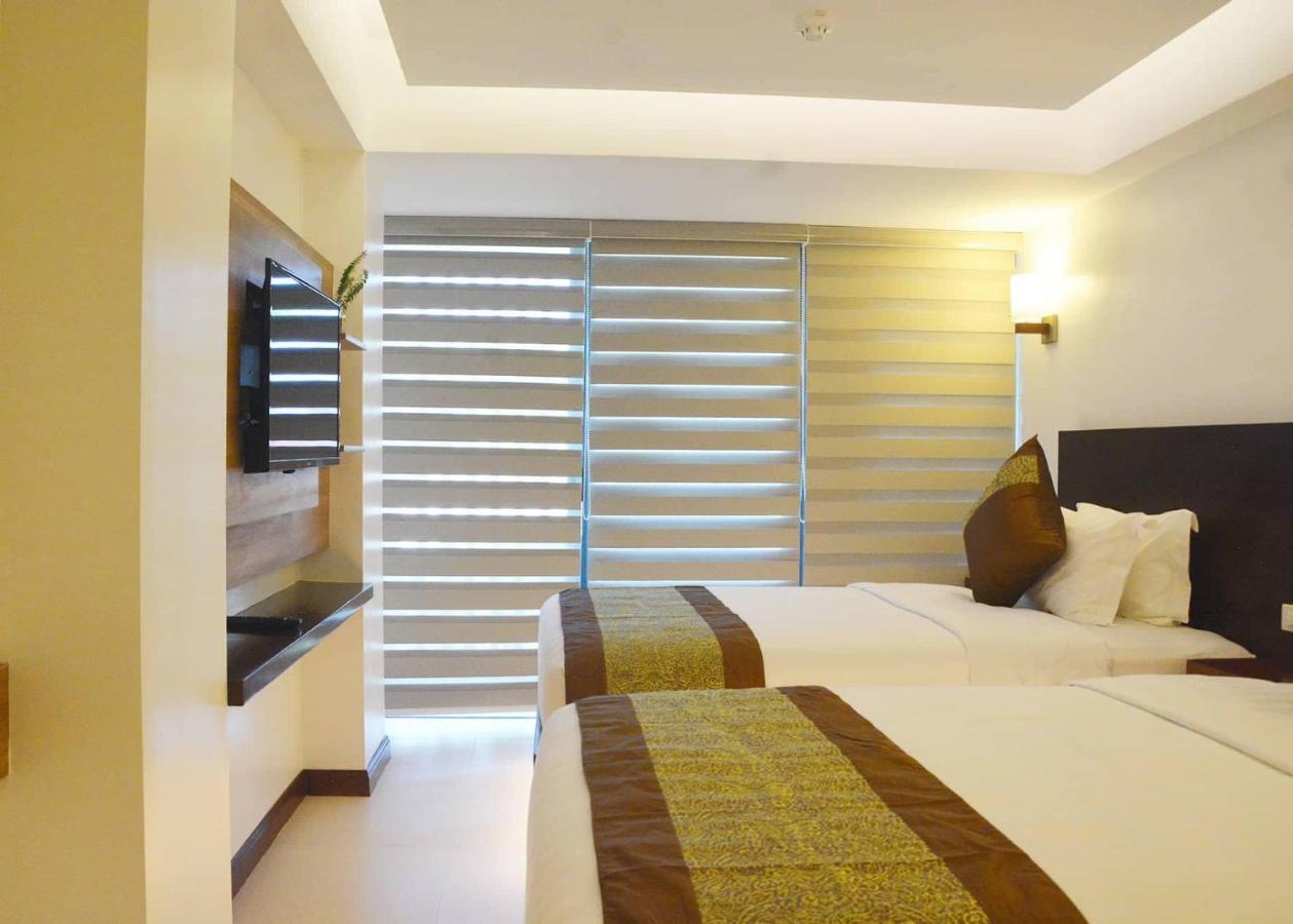 คอมแมนเดอร์ สวีท เดอ โบราไกย์ Hotel Manoc-Manoc ภายนอก รูปภาพ