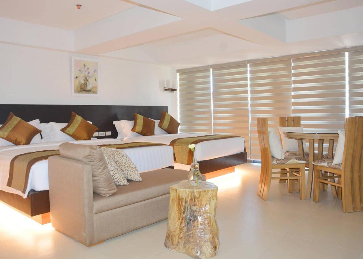 คอมแมนเดอร์ สวีท เดอ โบราไกย์ Hotel Manoc-Manoc ภายนอก รูปภาพ