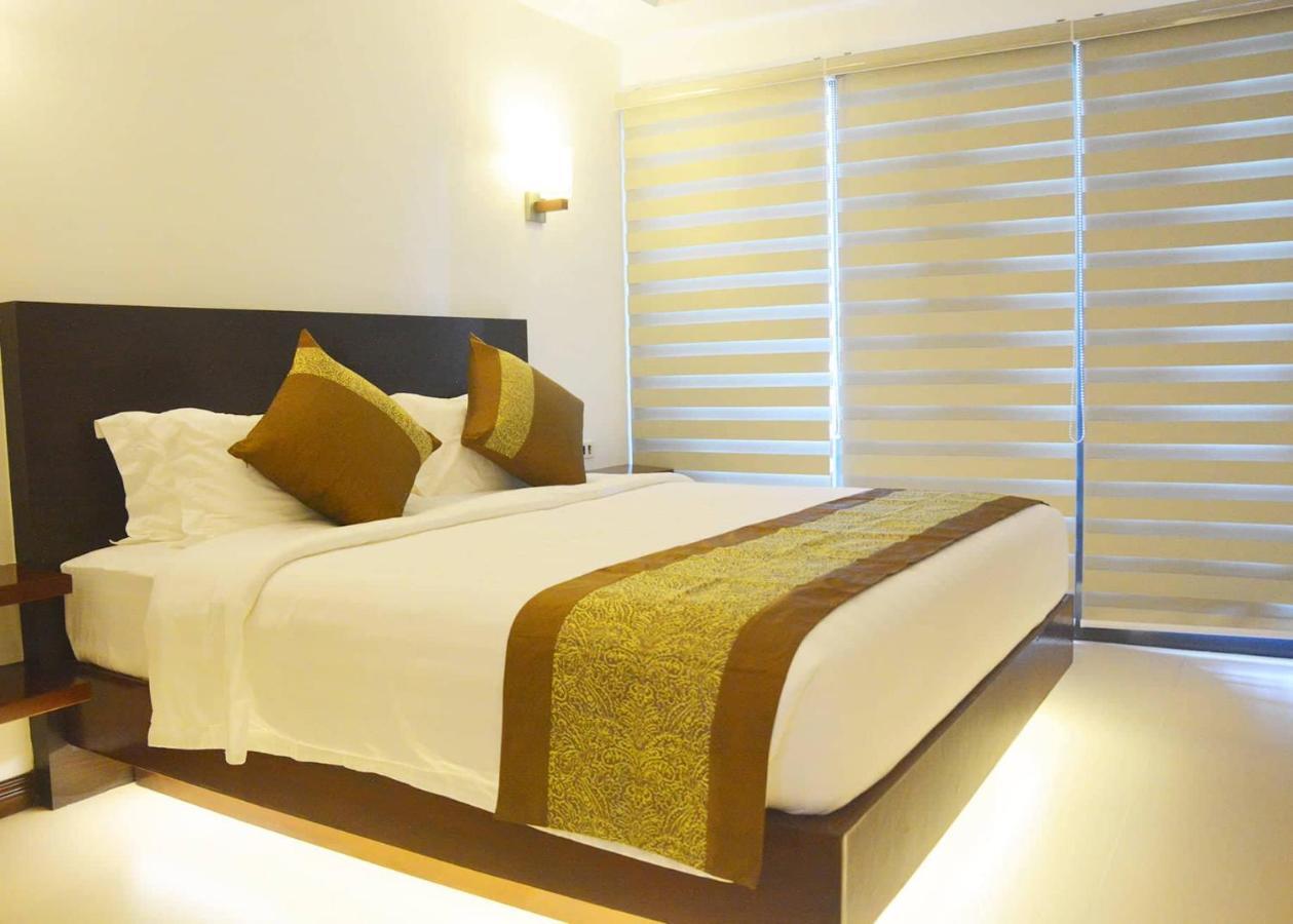 คอมแมนเดอร์ สวีท เดอ โบราไกย์ Hotel Manoc-Manoc ภายนอก รูปภาพ