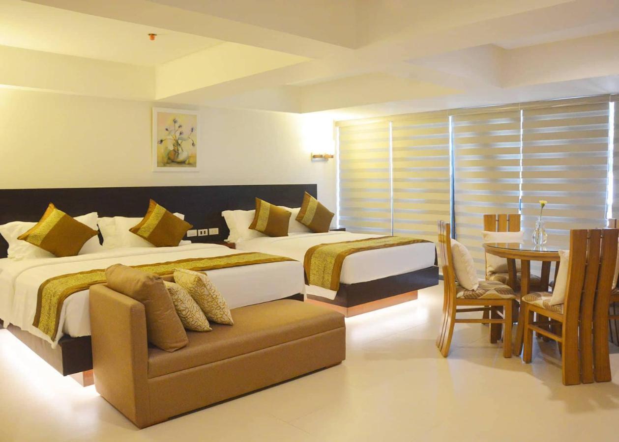 คอมแมนเดอร์ สวีท เดอ โบราไกย์ Hotel Manoc-Manoc ภายนอก รูปภาพ