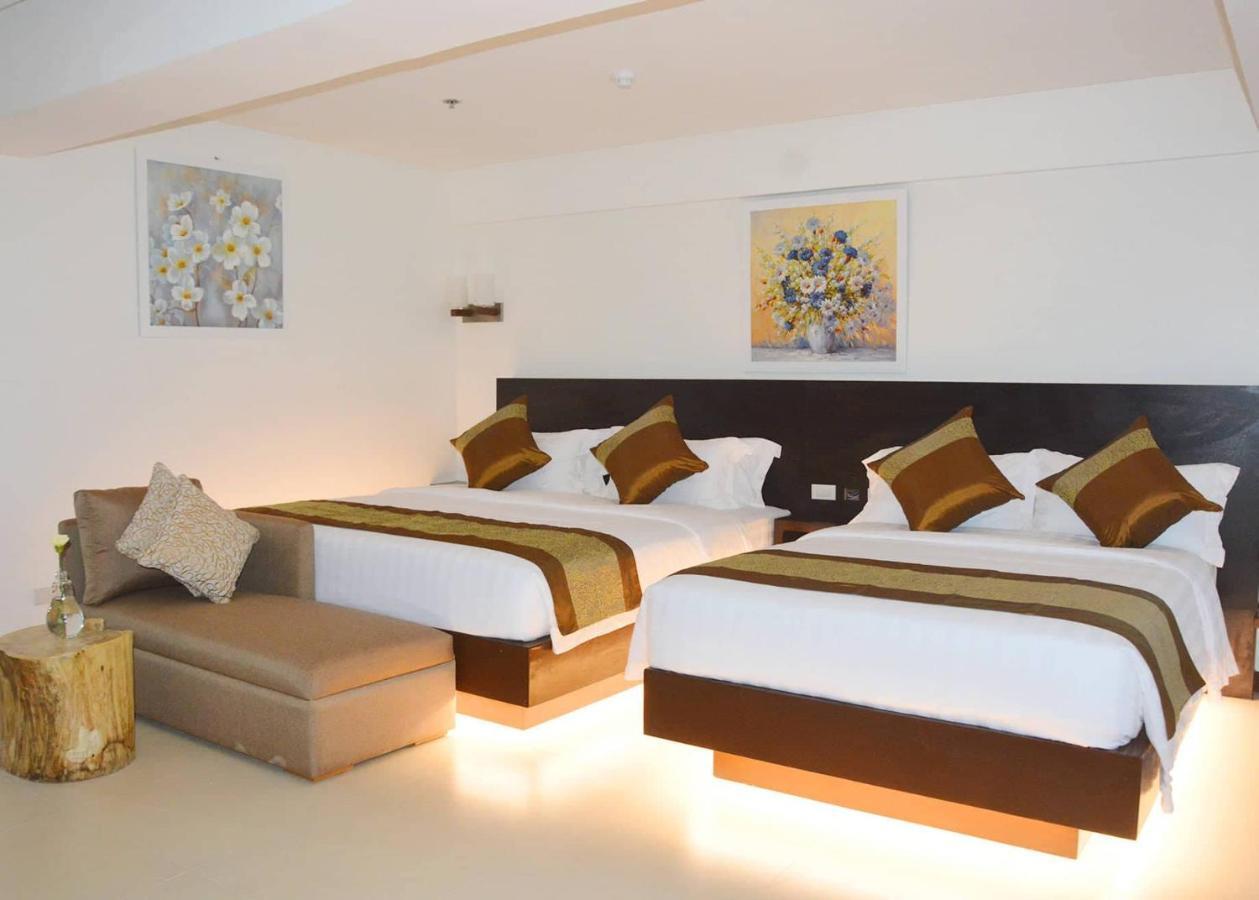 คอมแมนเดอร์ สวีท เดอ โบราไกย์ Hotel Manoc-Manoc ภายนอก รูปภาพ